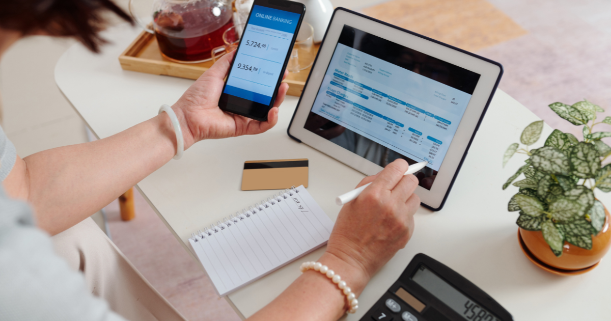 A therapist reviewing payment details with a patient, representing private pay therapy rates in a cash-based practice.