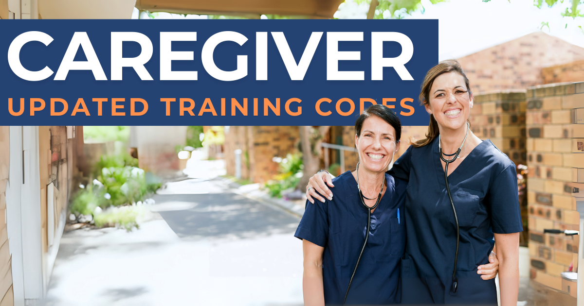 Two caregivers supporting each other during a training session, symbolizing teamwork and skill development aligned with caregiver training codes