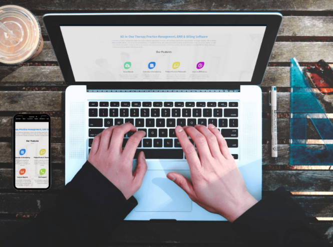 Therapist doing EMR charting for therapists on a laptop computer