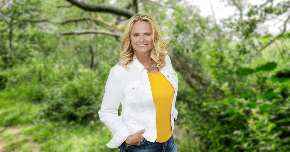 Michelle Holloway, occupational therapist and solo practitioner, standing outdoors and smiling—sharing her experience with the challenges of a solo practitioner.