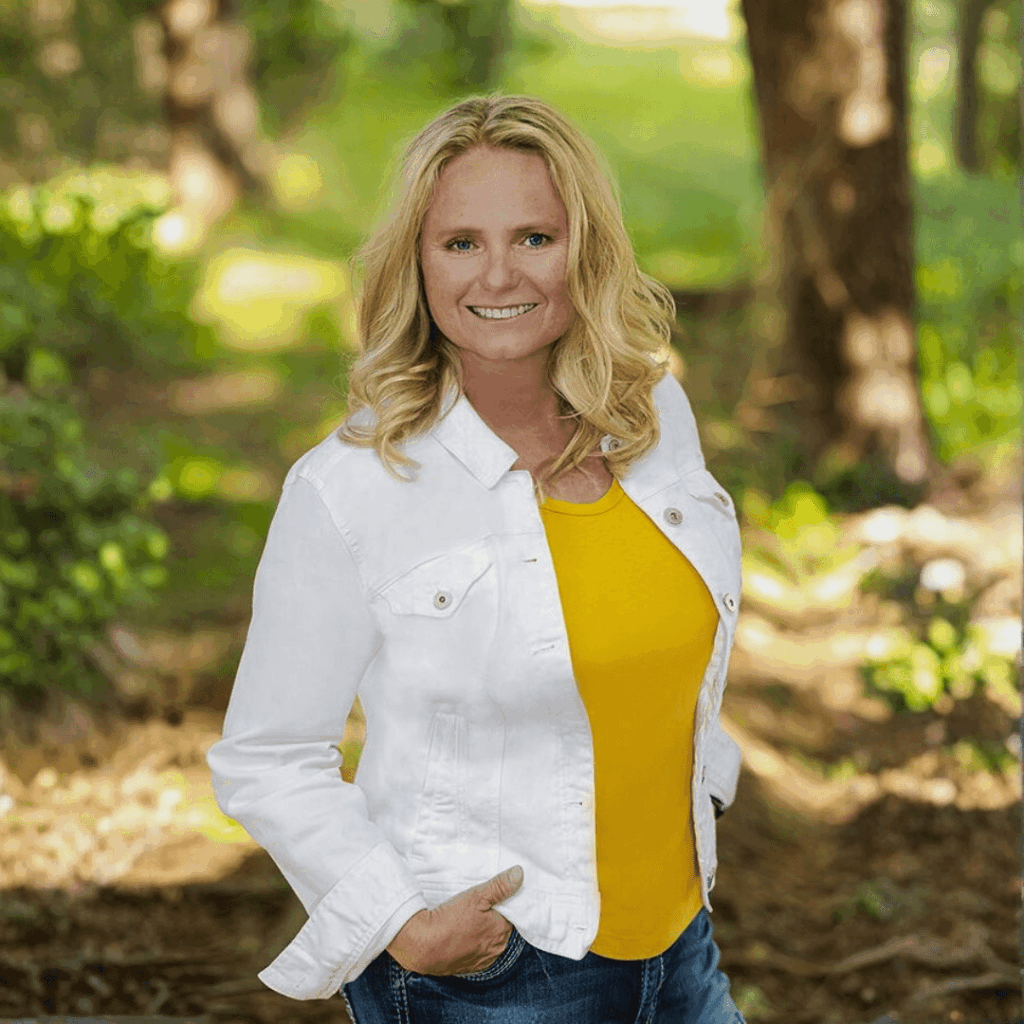 Therapist sharing her story about the challenges of a solo practitioner, smiling confidently outdoors