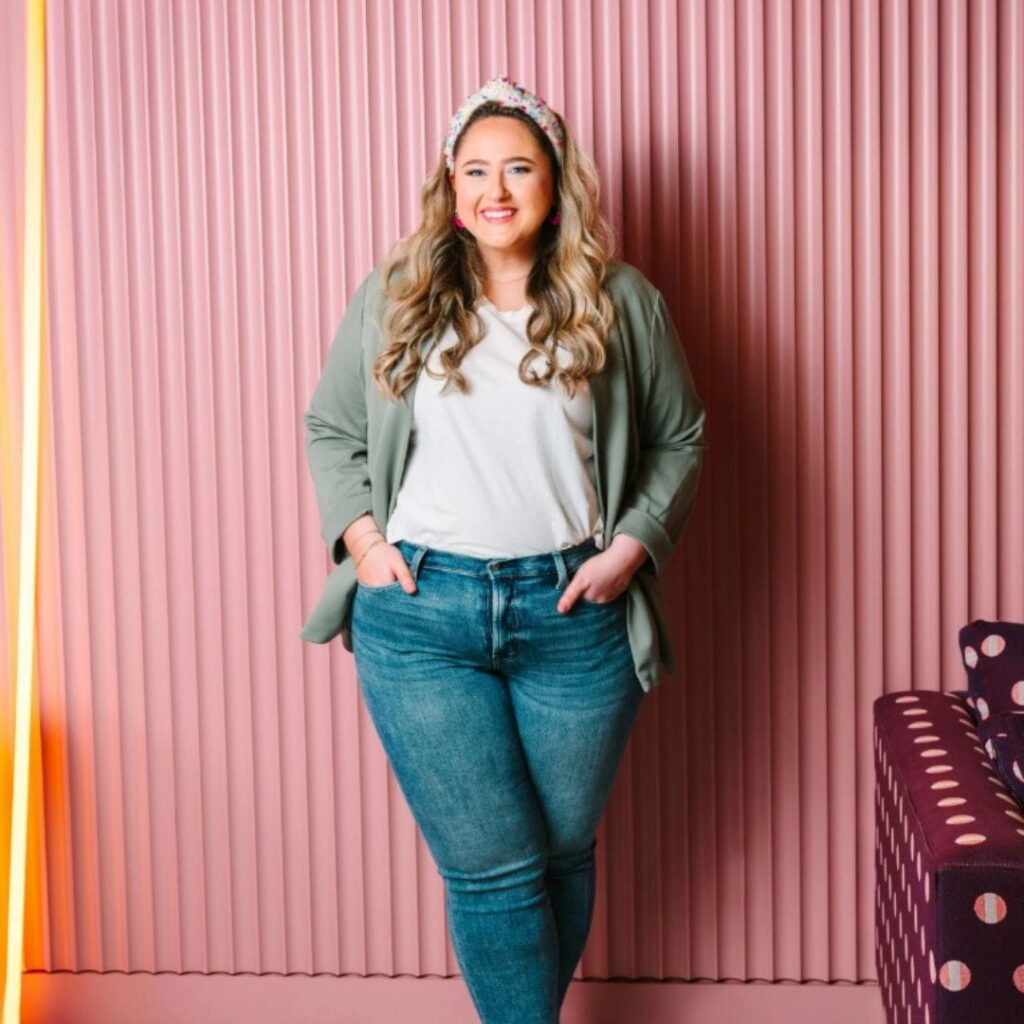 Jillian Pendergast stands in her clinic next to a whiteboard outlining the "EMR Scaling Workflow": Tribal Knowledge to Spreadsheets, Geographic Intelligence, and AI Optimization. A laptop on the desk shows a Manatee County territory map. The image is a 1080x1080 high-resolution portrait in a modern pediatric therapy setting.
